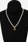 Dior Gold-Tone Pearl Necklace with “D” Charm